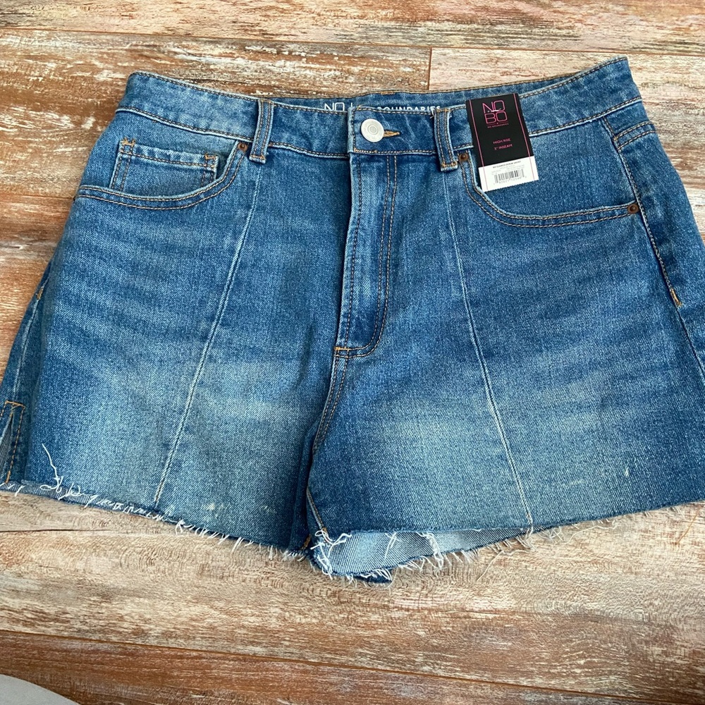 Denim cut off shorts. Juniors size 13. NWT